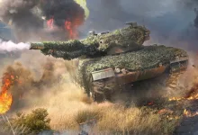 A camouflaged tank fires across a smoky battlefield in War Thunder.