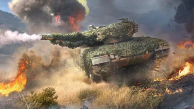 A camouflaged tank fires across a smoky battlefield in War Thunder.