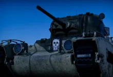 A close view of a War Thunder tank with a white skull decal on its front armor.