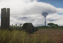 A missile vehicle stands in a field beneath a distant mushroom cloud.
