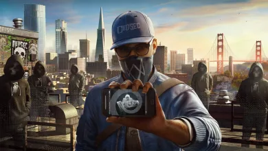 A masked DedSec member holds up a smartphone against a San Francisco skyline and the Golden Gate Bridge.