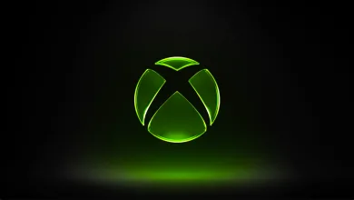 A glowing green Xbox logo against a black background.